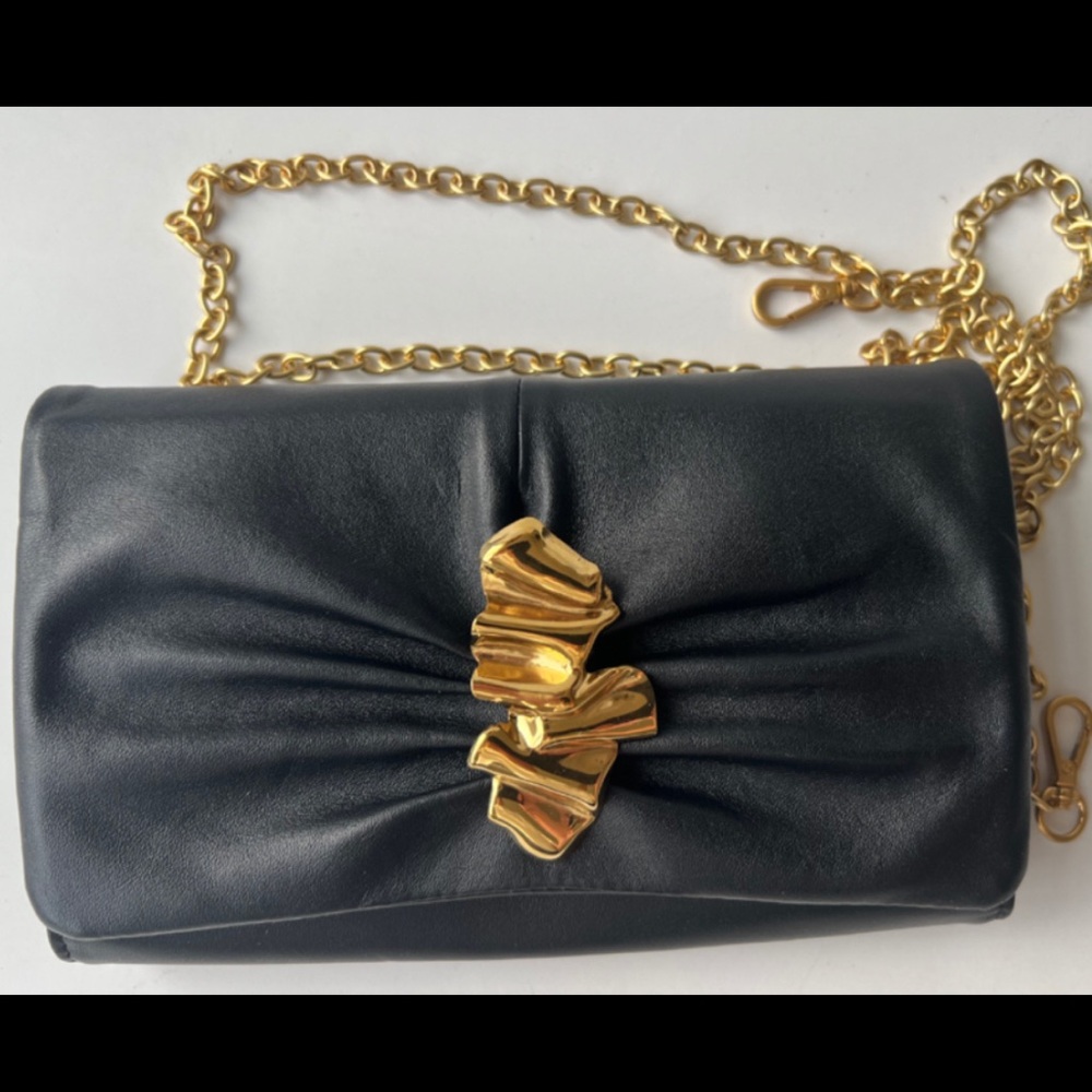 Italian leather clutch with Gold Ripple hardware with detachable long chain.